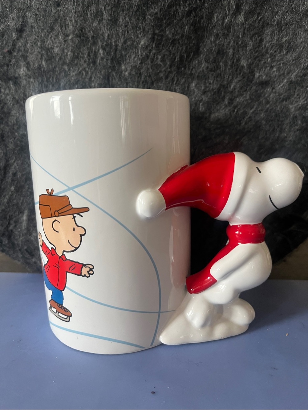 Peanuts White Ceramic Mug with Red Snoopy Handle and Charlie Brown Illustration